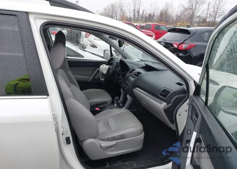 2014 Subaru Forester 2.5I Touring z USA, uszkodzony, nr VIN JF2SJAMC9EH440535
